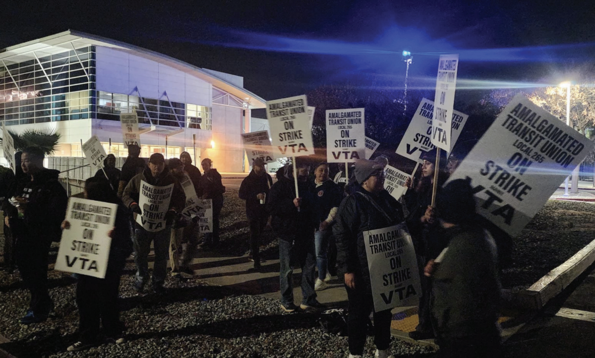 Union members from Amalgamated Transit Union Local 265 march and picket around Valley Transportation Authority North Yard in Mountain View on Monday.